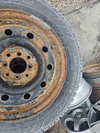 4 - 195/60R15 studded snow tires
