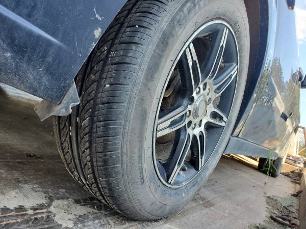 4 NICE 215/60R16 M&S tires w/aftermarket wheels