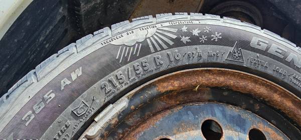4 215/55r16 M&S tires mounted on Nissan maxima steel wheels