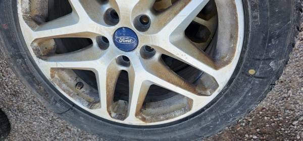 4 - 225/55r17 studded snow tires