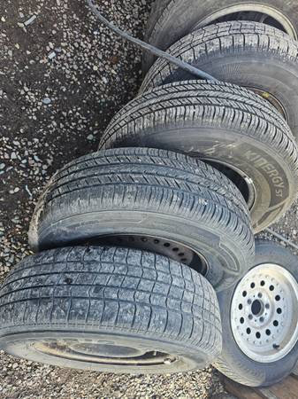 4 - 215/70R15 M&S tires w/wheels (5×114.3 lug pattern)