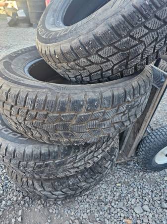 4 Nice 225/70r16 studded snow tires