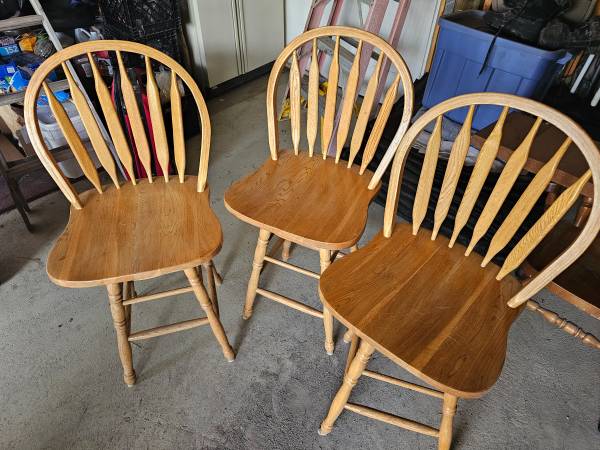 3 simulated dark oak bar stools with swivel seats