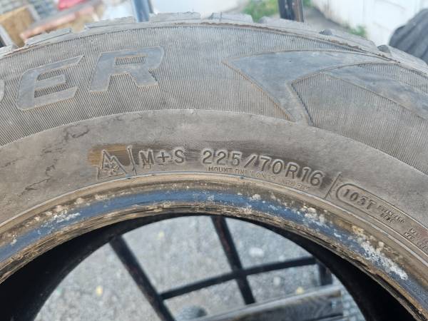 4 Nice 225/70r16 studded snow tires