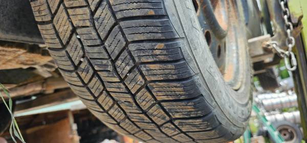 4 215/55r16 M&S tires mounted on Nissan maxima steel wheels