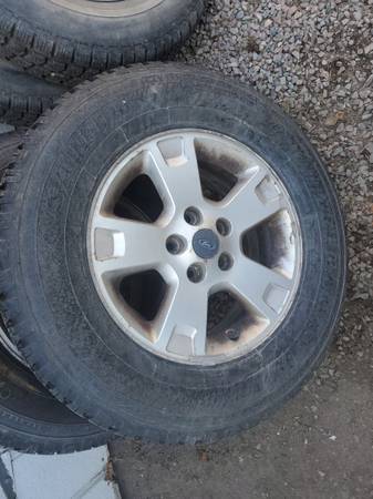 Four 235/70r16 M&S tires NEAR NEW