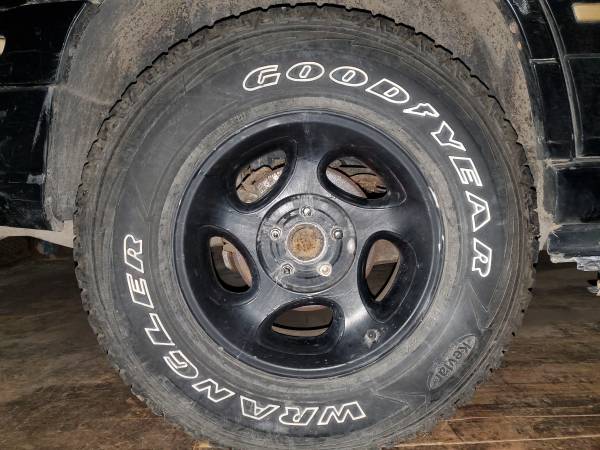 4 - goodyear wrangler kevlar 245/75r16 M+S tires and wheels